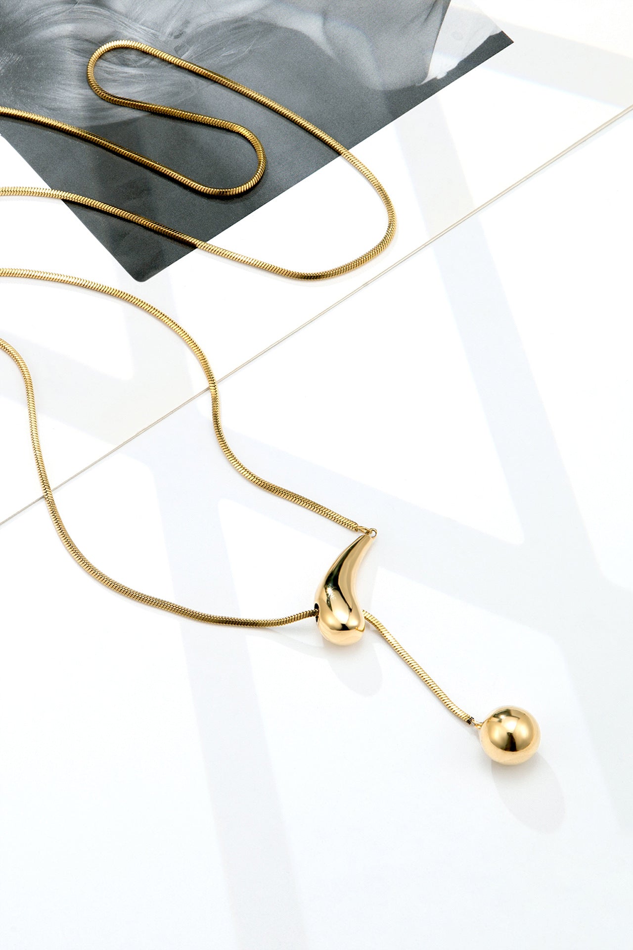 Creative Drawstring Water Drop Ball Necklace Titanium Steel