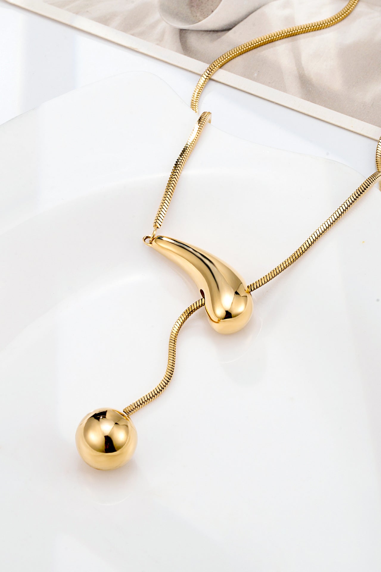 Creative Drawstring Water Drop Ball Necklace Titanium Steel